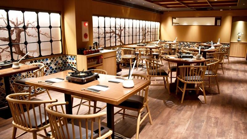 Kyoto Station dining room with painted plum-blossom windows